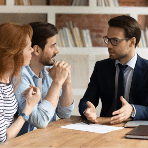 Couple consulting with a professional advisor.