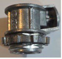 Close-up of a small metallic mechanical component with grooves and a latch.