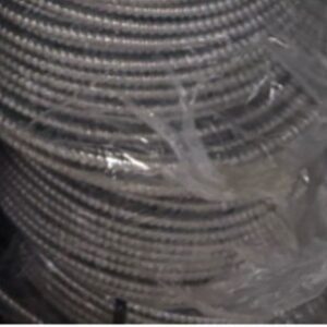 Close-up of coiled metal wire wrapped in plastic.