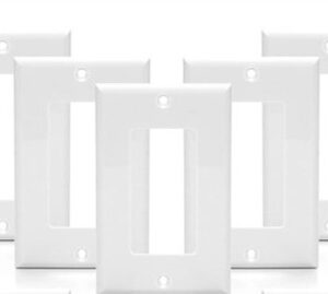 A set of white single-gang light switch wall plates.