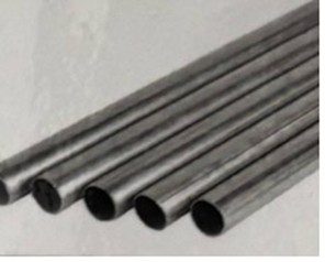 Four black metal pipes arranged parallel on a white surface.