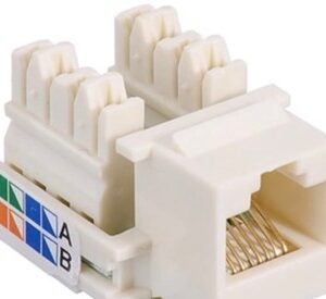 Close-up of a white Cat6 Ethernet keystone jack.