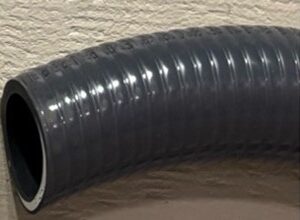 Close-up of a black flexible corrugated hose.