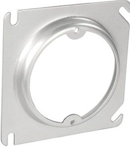 Close-up of a metal mounting bracket with a circular cutout and screw holes.