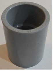 A gray PVC pipe fitting with a smooth inner surface.