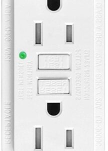 Close-up of an electrical wall outlet with two plug slots and a green indicator light.
