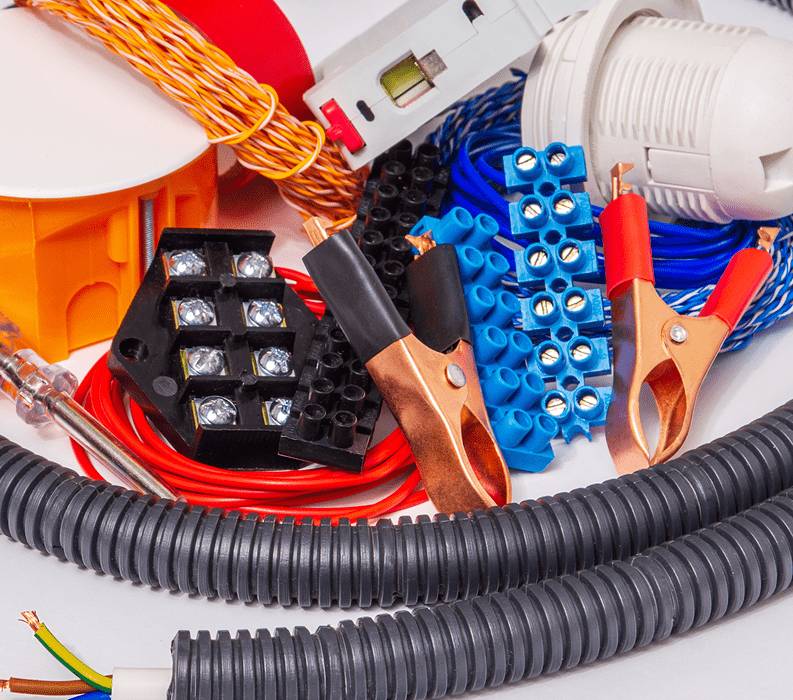 Various electrical tools and components arranged together.